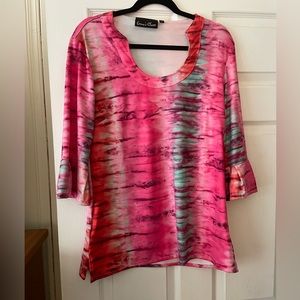 Beautiful, bright colored blouse.